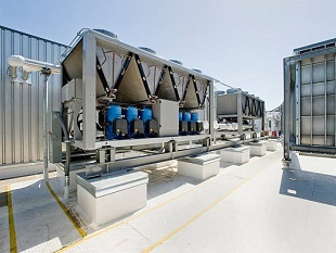 Precision Cooling: The Role of Chiller Cooling Towers in Industrial Settings